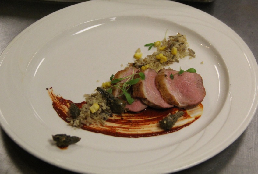 Seared Achiote Duck Breast with wild rice and quinoa pilaf with sauteed cholla buds. Photo by Elizabeth Hoover