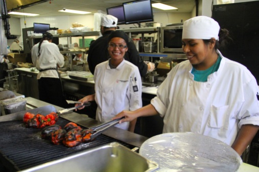 Navajo tech students roasting peppers. Photo by Elizabeth Hoover